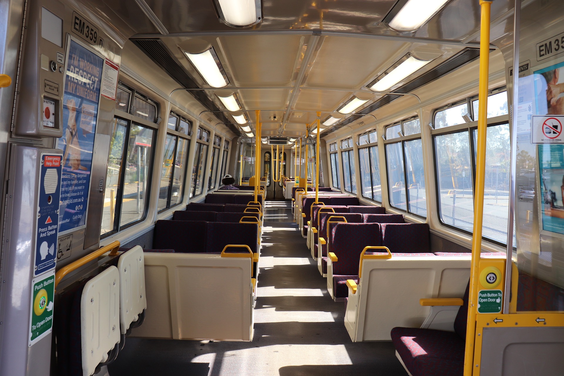Image of the interior of a Queensland Rail passenger train.
